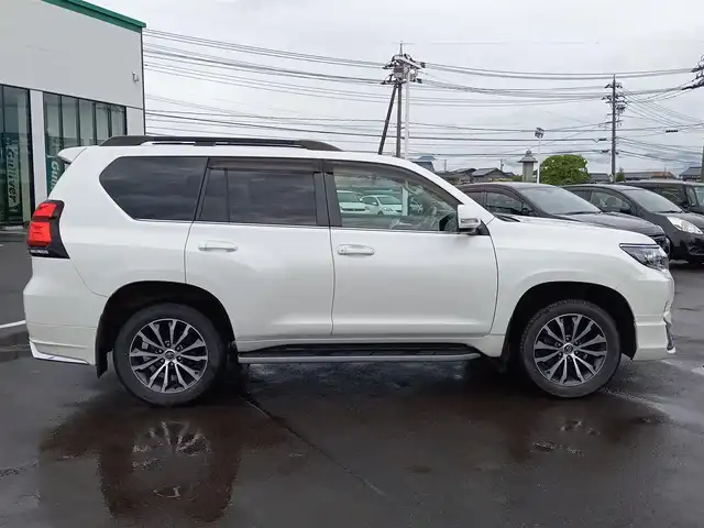 トヨタ ランドクルーザー プラド TZ－G 福井県 2018(平30)年 3.5万km ホワイトパールクリスタルシャイン 衝突被害軽減システム/メーカーOPナビ（B9129）/・（フルセグTV/CD/DVD/Bluetooth）/アラウンドビューモニター/ビルトインETC2.0/モデリスタエアロ/ステアリングスイッチ/シートヒーター・クーラー/前席パワーシート/オートLEDライト/電動格納ウィンカーミラー/純正19インチAW/純正フロアマット/スマートキー
