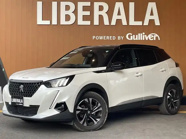 プジョー ２００８ GT 高知県 2022(令4)年 2.4万km パール 純正ディスプレイオーディオ/　【AppleCarPlay/ＡｎｄｒｏｉｄＡｕｔｏ】/サンルーフ/アクティブセーフティブレーキ/クルーズコントロール/ブラインドスポットモニター/レーンキープアシスト/インテリジェントハイビーム/パーキングセンサー/タイヤ空気圧警告/アンビエンスライト/ハーフレザーシート/シートヒーター