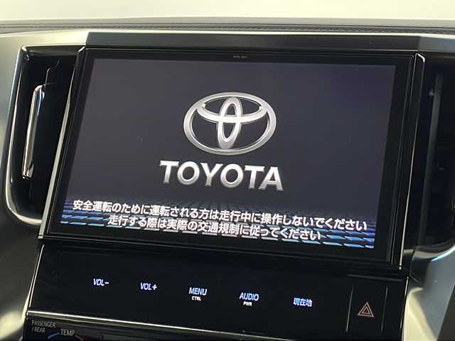 トヨタ ヴェルファイア Z Gエディション 新潟県 2018(平30)年 6.5万km ブラック 禁煙車/純正SDナビ(フルセグテレビ)/トヨタセーフティーセンス/純正12.1インチフリップダウンモニター/両側パワースライドドア/2眼LEDヘッドライト/フロントフォグLED/プラズマクラスターnanoe/クリアランスソナー/追従走行クルーズコントロール/オットマン/黒ウッド調パネル/ウッドコンビシフトノブ/前方ドライブレコーダー/ビルトインETC/バックカメラ/純正アルミホイール/純正フロアマット/保証書・取扱説明書