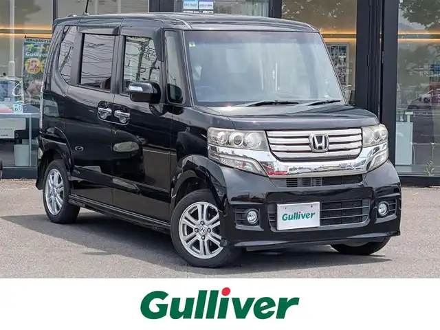 ホンダ Ｎ ＢＯＸ カスタム G Lパッケージ 福井県 2012(平24)年 13.1万km クリスタルブラックパール ４WD/純正14インチAW/キセノンヘッドライト/Fフォグ/片側パワースライドドア/バックカメラ/純正SDナビ（CD/DVD/BT/USB/iPod）/フルセグテレビ/横滑り防止装置/盗難防止装置/アイドリングストップ/純正フロアマット/スマートキー/ダブルエアバッグ