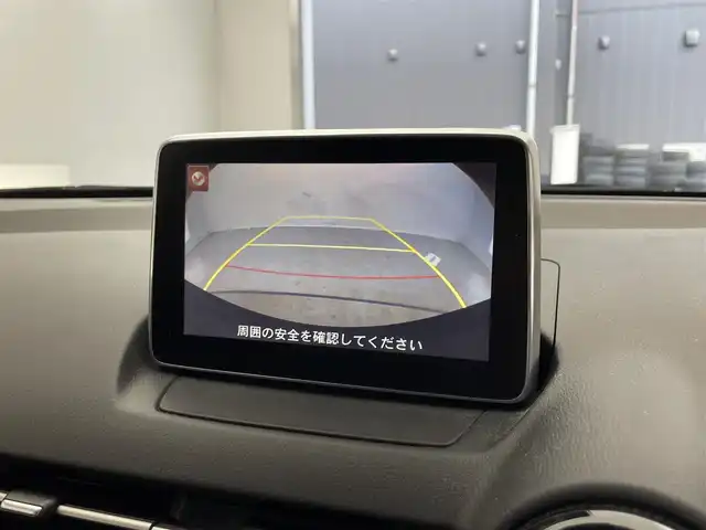 マツダ デミオ 13S 広島県 2016(平28)年 2万km ソウルレッドプレミアムメタリック 禁煙/純正ナビ/(Bluetooth/CD/DVD/AUX/フルセグTV)/バックカメラ/ETC/前後ドライブレコーダー/シートヒーター（運転席/助手席）/純正フロアマット/LEDヘッドライト/オートライト/ブラインドスポットモニター/衝突被害軽減ブレーキ/レーンキープアシスト/横滑り防止装置/アイドリングストップ/プッシュスタート/スマートキー/スペアキー1本