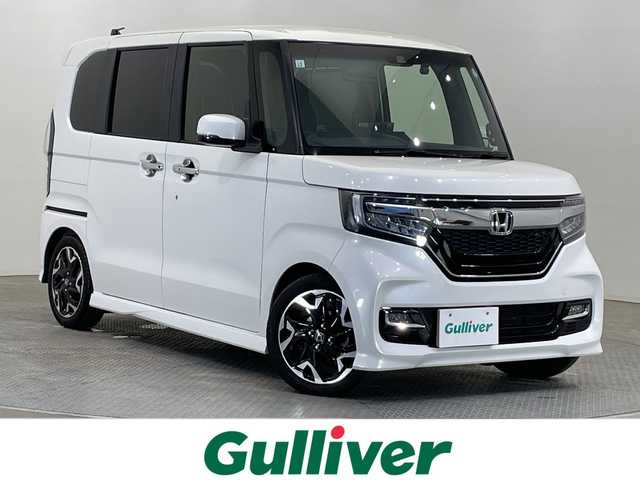 ホンダ Ｎ ＢＯＸ カスタム G L ターボ ホンダセンシング 栃木県 2019(令1)年 2.6万km プラチナホワイトパール 10インチフローティングナビ(CN-F1X10BD)/(フルセグTV/Bluetooth/CD/DVD/Blu-ray/USB)/ターボ/4WD/車高調/ホンダセンシング/ ・衝突軽減システム/ ・レーンキープアシスト/ ・オートクルーズコントロール/ ・オートハイビーム/シーケンシャルウィンカー/前後ドライブレコーダー/両側パワースライドドア/MTモード付AT/ハーフレザーシート/シートカバー(合皮黒)/前席シートヒーター/アイドリングストップ/LEDヘッドライト/オートライト/純正アルミホイール/純正フロアマット/スマートキー/スペアキー1本/取扱説明書