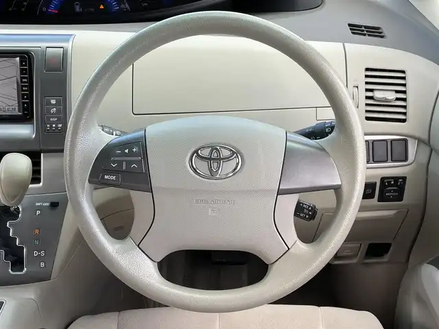 トヨタ エスティマ ハイブリッド X 道央・札幌 2009(平21)年 11.8万km ホワイトパールクリスタルシャイン ４WD/純正ディーラーOPナビ/CD/DVD/BT/フルセグ/純正フリップダウンモニター/クルーズコントロール/バックカメラ/ビルトインETC/AFS/EVMODE/SNOWMODE/片側パワースライドドア/2列目オットマン/ステアリングリモコン/AC100V/プッシュスタート/スマートキー/HIDヘッドライト/オートライト/フォグランプ/電動格納ミラー/ウィンカーミラー/純正フロアマット/ドアバイザー/スペアキー/社外エンジンスターター