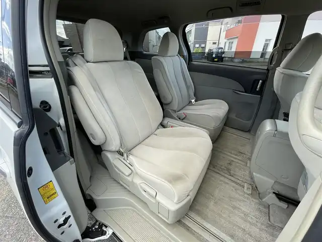 トヨタ エスティマ ハイブリッド X 道央・札幌 2009(平21)年 11.8万km ホワイトパールクリスタルシャイン ４WD/純正ディーラーOPナビ/CD/DVD/BT/フルセグ/純正フリップダウンモニター/クルーズコントロール/バックカメラ/ビルトインETC/AFS/EVMODE/SNOWMODE/片側パワースライドドア/2列目オットマン/ステアリングリモコン/AC100V/プッシュスタート/スマートキー/HIDヘッドライト/オートライト/フォグランプ/電動格納ミラー/ウィンカーミラー/純正フロアマット/ドアバイザー/スペアキー/社外エンジンスターター