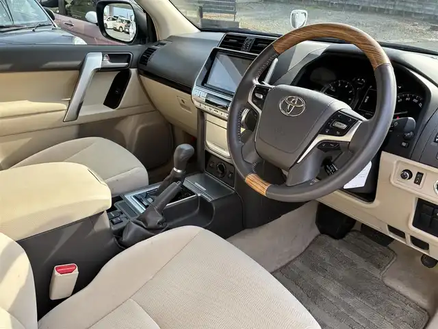 トヨタ ランドクルーザー プラド TX 熊本県 2021(令3)年 2.3万km ホワイトパールクリスタルシャイン ワンオーナー/4WD/純正SDナビ（NSZT-Y68T）/【フルセグTV/SD/CD/DVD/Bluetooth/USB】/衝突被害軽減システム/レーダークルーズコントロール/パーキングサポートブレーキ/レーンキープアシスト/車両接近通報装置/コーナーセンサー/オートLEDライト/オートマチックハイビーム/ビルトインETC/ドライブレコーダー(ZDR-015)/横滑り防止装置/盗難防止装置/純正フロアマット/カーテンエアバッグ/三列シート/プッシュスタート/スマートキー/スペアキー/取扱説明書/保証書