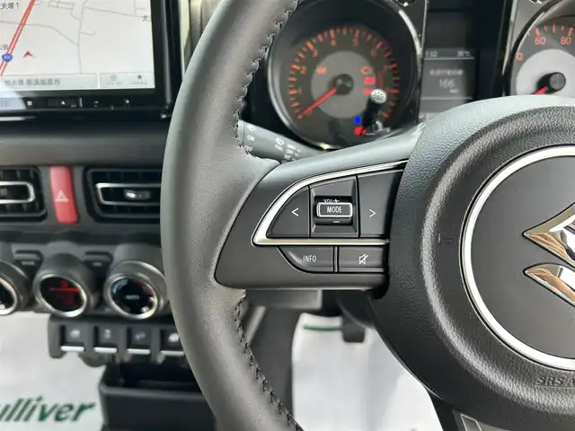 スズキ ジムニー XC 栃木県 2025(令7)年 0.1万km ジャングルグリーン 衝突被害軽減ブレーキ/4WD/カロッツェリア9インチナビ/フルセグTV/DVD/Bluetooth/バックカメラ/ビルトインETC/前ドライブレコーダー/前席シートヒーター/クルーズコントロール/スマートキー×1/プッシュスタート/ステアリングリモコン/LEDオートライト/純正16インチAW/アイドリングストップ/横滑り防止装置/保証書/取説