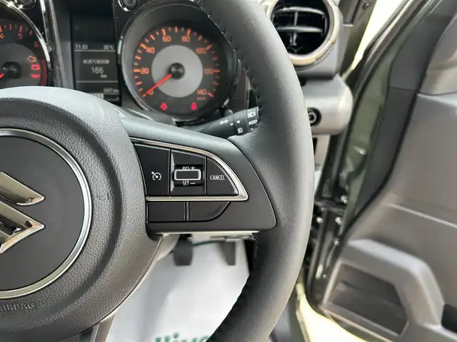 スズキ ジムニー XC 栃木県 2025(令7)年 0.1万km ジャングルグリーン 衝突被害軽減ブレーキ/4WD/カロッツェリア9インチナビ/フルセグTV/DVD/Bluetooth/バックカメラ/ビルトインETC/前ドライブレコーダー/前席シートヒーター/クルーズコントロール/スマートキー×1/プッシュスタート/ステアリングリモコン/LEDオートライト/純正16インチAW/アイドリングストップ/横滑り防止装置/保証書/取説