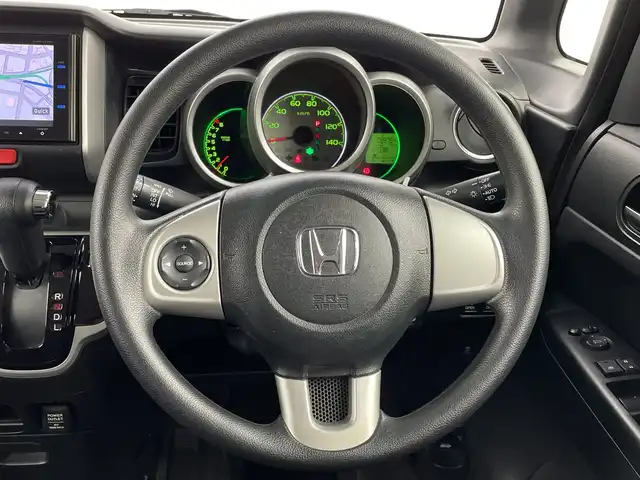 ホンダ Ｎ ＢＯＸ G 新潟県 2013(平25)年 4万km プレミアムブロンズパール 4WD/社外メモリナビ/フルセグ/VXM-145VFi/　CD/DVD/SD/Bluetooth/両側パワースライドドア/スマートキー/プッシュスタート/オートエアコン/キセノンヘッドライト/オートライト/電動格納式ミラー/横滑り防止装置/社外アルミ付きスタッドレス/　（積み込み５mm）
