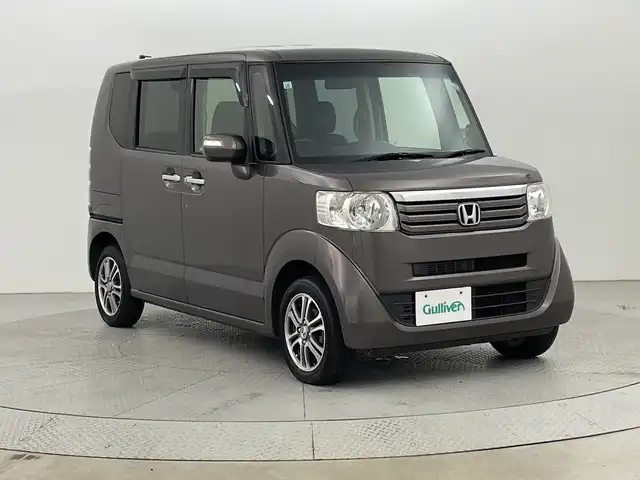 ホンダ Ｎ ＢＯＸ G 新潟県 2013(平25)年 4万km プレミアムブロンズパール 4WD/社外メモリナビ/フルセグ/VXM-145VFi/　CD/DVD/SD/Bluetooth/両側パワースライドドア/スマートキー/プッシュスタート/オートエアコン/キセノンヘッドライト/オートライト/電動格納式ミラー/横滑り防止装置/社外アルミ付きスタッドレス/　（積み込み５mm）