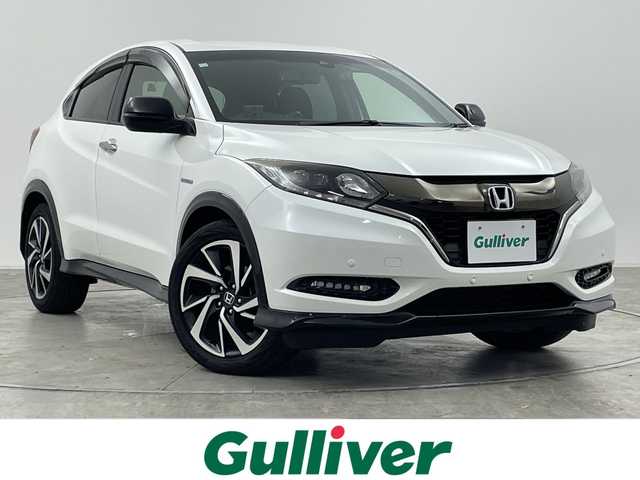 ホンダ ヴェゼル ハイブリッド RS ホンダセンシング 群馬県 2016(平28)年 5.9万km ホワイトオーキッドパール 純正８型ナビ　追従クルーズコントロール　バックカメラ　レーンキープアシスト　プリクラッシュ　前席シートヒーター　ハーフレザーシート　前後ドラレコ　コーナーセンサー　横滑り防止　ＥＴＣ　禁煙車