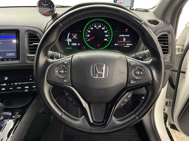 ホンダ ヴェゼル ハイブリッド RS ホンダセンシング 群馬県 2016(平28)年 5.9万km ホワイトオーキッドパール 純正８型ナビ　追従クルーズコントロール　バックカメラ　レーンキープアシスト　プリクラッシュ　前席シートヒーター　ハーフレザーシート　前後ドラレコ　コーナーセンサー　横滑り防止　ＥＴＣ　禁煙車