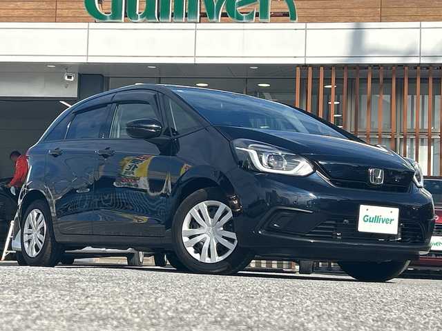 ホンダ フィット ホーム 沖縄県 2022(令4)年 0.7万km ミッドナイトブルービームM 純正ナビ　/ＣＤ/ＤＶＤ/ＢＴ/フルセグＴＶ　/バックカメラ　/クルーズコントロール/ＬＥＤヘッドライト　/ステアリングスイッチ　/アイドリングストップ　/オートライト　/ブレイクホールドボタン/ＳＯＳボタン/電動格納ミラー　/スマートキー