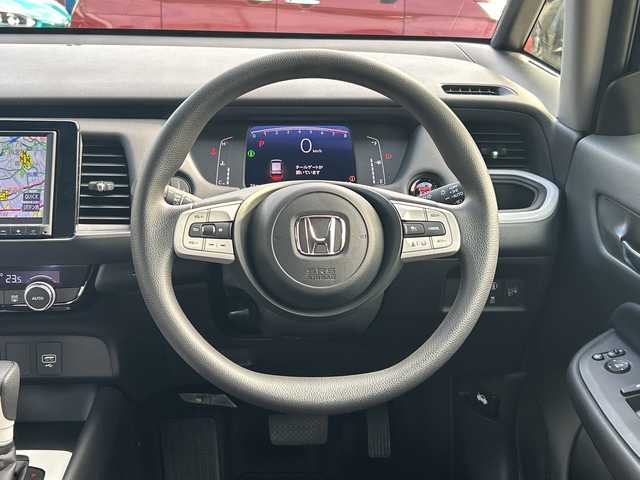 ホンダ フィット ホーム 沖縄県 2022(令4)年 0.7万km ミッドナイトブルービームM 純正ナビ　/ＣＤ/ＤＶＤ/ＢＴ/フルセグＴＶ　/バックカメラ　/クルーズコントロール/ＬＥＤヘッドライト　/ステアリングスイッチ　/アイドリングストップ　/オートライト　/ブレイクホールドボタン/ＳＯＳボタン/電動格納ミラー　/スマートキー