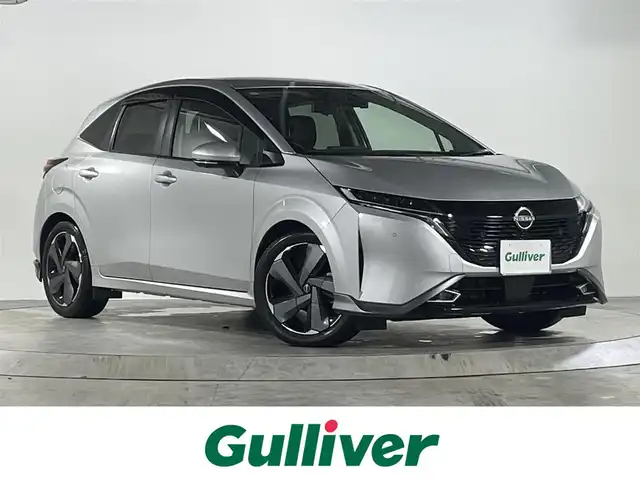 日産 オーラ G 広島県 2022(令4)年 3.1万km ブリリアントシルバー 禁煙車/BOSEスピーカー/エマージェンシーブレーキ/車線逸脱警報/ハイビームアシスト/BSW/速度標識認識/道路標識認識/プロパイロット/コーナーセンサー/インテリジェントルームミラー/NissanConnectナビ+通信+SOS/・フルセグ/HDMI/USB/Applecarplay/アラウンドビューモニター/ワイヤレス充電/ハーフレザーシート/LEDヘッドライト/フォグランプ/スマートキー/プッシュスタート/トノカバー/純正ドアバイザー/ETC2.0/純正前ドライブレコーダー/純正１７インチアルミホイール/W+サイド+カーテンエアバック
