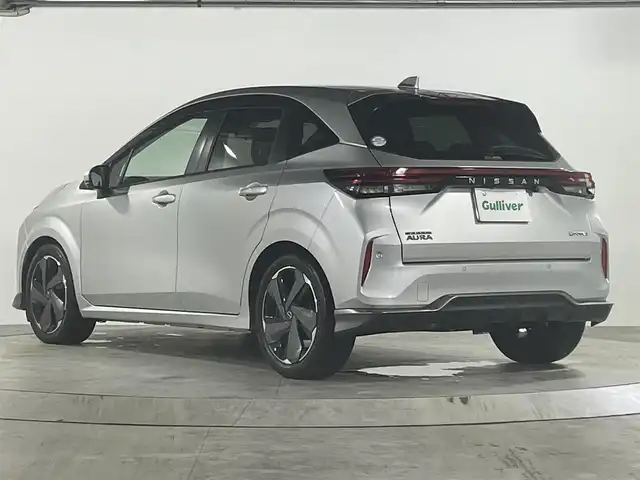 日産 オーラ G 広島県 2022(令4)年 3.1万km ブリリアントシルバー 禁煙車/BOSEスピーカー/エマージェンシーブレーキ/車線逸脱警報/ハイビームアシスト/BSW/速度標識認識/道路標識認識/プロパイロット/コーナーセンサー/インテリジェントルームミラー/NissanConnectナビ+通信+SOS/・フルセグ/HDMI/USB/Applecarplay/アラウンドビューモニター/ワイヤレス充電/ハーフレザーシート/LEDヘッドライト/フォグランプ/スマートキー/プッシュスタート/トノカバー/純正ドアバイザー/ETC2.0/純正前ドライブレコーダー/純正１７インチアルミホイール/W+サイド+カーテンエアバック