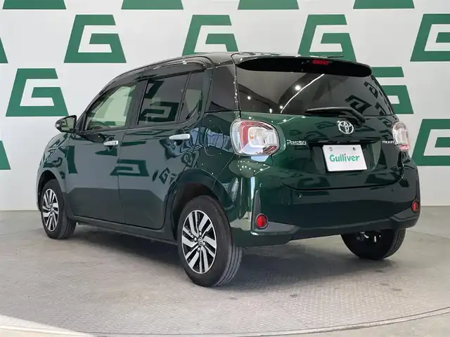 トヨタ パッソ モーダ　チャーム 鹿児島県 2023(令5)年 3.1万km ブラックマイカメタリック/ダークエメラルドマイカ 2トーン 禁煙車/スマートアシストIII/　・レーンキープアシスト/　・先行車発進お知らせ機能/　・誤発進抑制機能/　・オートマチックハイビーム/純正ディーラーオプションナビ(NSCN-W68)/　・Bluetooth/　・ワンセグTV/　・AUX/　・AM/FM/前後コーナーセンサー/LEDヘッドライト/全周囲カメラ/前後ドライブレコーダー/ETC/純正フロアマット/純正アルミホイール/電動格納ミラー/ドアバイザー/ステアリングリモコン