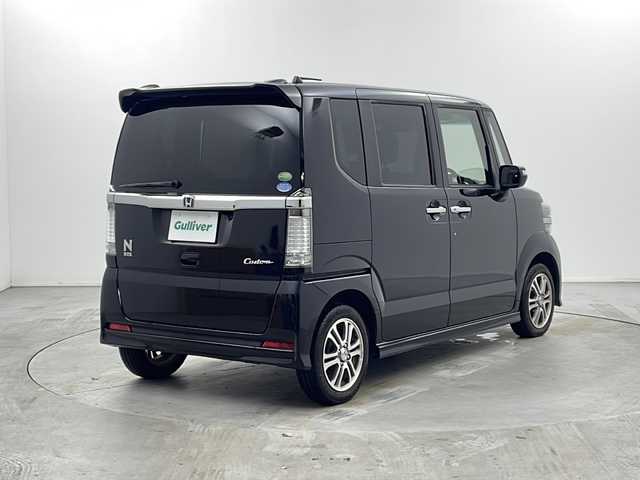 ホンダ Ｎ ＢＯＸ カスタム G Lパッケージ 栃木県 2013(平25)年 12.6万km クリスタルブラックパール 社外ナビ/（BT/フルセグ/CD/DVD/AM/FM）/横滑り防止/両側パワースライドドア/バックカメラ/アイドリングストップ/ETC/電動格納ミラー/純正アルミホイール/純正フロアマット/ステアリングスイッチ/プッシュスタート/スマートキー/スペアキー/保証書/取扱説明書