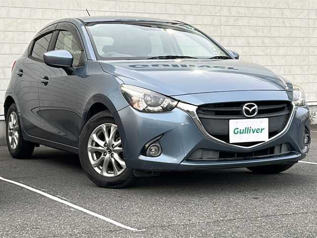 マツダ デミオ 13S 茨城県 2015(平27)年 5.3万km ブルーリフレックスマイカ 純正メモリナビ/(地デジTV・CD・DVD・BT・ラジオ再生)/衝突軽減ブレーキ/バックカメラ/ETC/オートライト/LEDヘッドライト/純正15inアルミホイール/スマートキー/スペアキー/取扱説明書/保証書