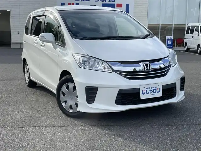ホンダ フリード G プレミアムエディション 東京都 2015(平27)年 7.3万km ホワイトオーキッドパール (株)IDOMが運営する【じしゃロン昭島店】の自社ローン専用車両になります。/こちらは現金またはオートローンご利用時の価格です。自社ローンご希望の方は別途その旨お申付け下さい/純正ナビ（ＳＤ・CD・ＴＶ）/バックカメラ/Bluetooth/ETC/両側パワースライドドア/オートライト/電格ミラー/ウィンカーミラー/純正フロアマット/純正アルミホイール