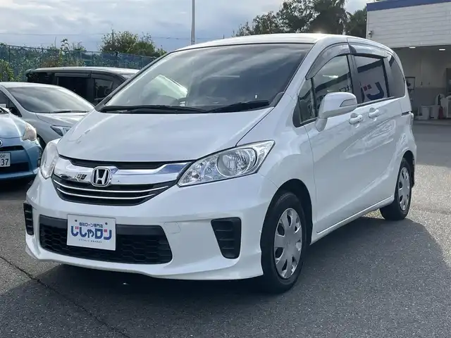 ホンダ フリード G プレミアムエディション 東京都 2015(平27)年 7.3万km ホワイトオーキッドパール (株)IDOMが運営する【じしゃロン昭島店】の自社ローン専用車両になります。/こちらは現金またはオートローンご利用時の価格です。自社ローンご希望の方は別途その旨お申付け下さい/純正ナビ（ＳＤ・CD・ＴＶ）/バックカメラ/Bluetooth/ETC/両側パワースライドドア/オートライト/電格ミラー/ウィンカーミラー/純正フロアマット/純正アルミホイール