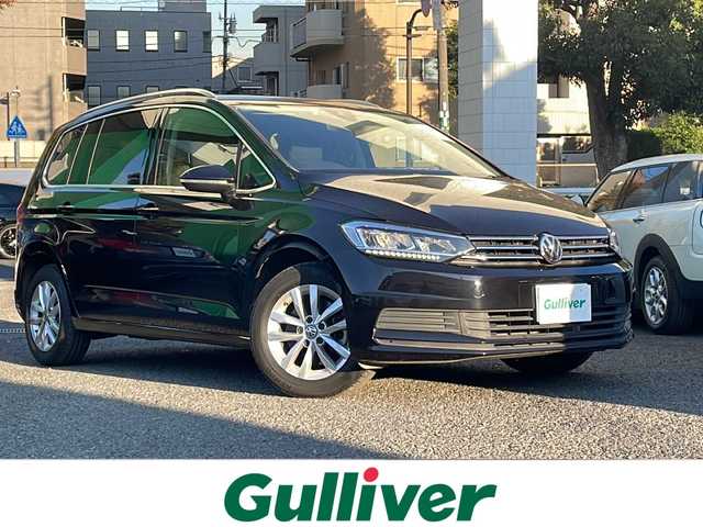 フォルクスワーゲン ゴルフ トゥーラン TSI コンフォートライン 東京都 2018(平30)年 3.8万km ディープブラックパールエフェクト 新車時保証書/取扱説明書　ナビ説明書/プリクラッシュブレーキシステム【歩行者検知】/リヤトラフィックアラート【後退時衝突軽減ブレーキ】/アダプティブクルーズコントロール/ブラインドスポットアシスト/レーンキープアシスト/アイドリングストップ/純正ナビ/フルセグTV/SD/CD/DVD/REC/BT/AUX/USB/AppleCarplay/バックカメラ　ETC【DSRC】/LEDヘッドライト/オートライト/キーレスキー×2/革巻きハンドル/純正16インチアルミ