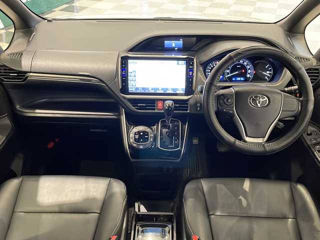 トヨタ エスクァイア Gi ブラックテーラード 福井県 2016(平28)年 13.1万km ホワイトパールクリスタルシャイン ４WD/ワンオーナー/アルパイン11インチメモリーナビ（EX11V）/フルセグTV/BT/CD/DVD/SD/USB/AUX/バックカメラ/10インチフリップダウンモニター（RSA10S-L-S)/セーフティセンス/・プリクラッシュセーフティ/・レーンディパーチャーアラート/・オートマチックハイビーム/・先行車発進警告機能/クルーズコントロール/ETC/パワースライドドア/レザーシート/シートヒーター/オートライト/LEDヘッドライト/社外アルミホイール/MTモード付AT/純正フロアマット/ステアリングスイッチ