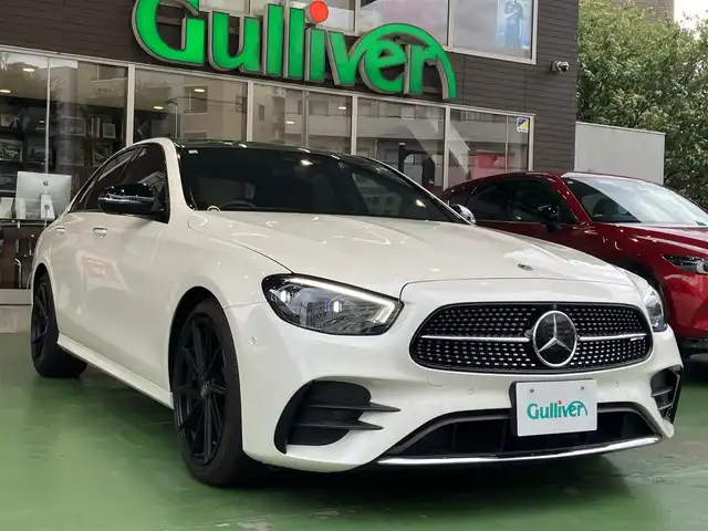 メルセデス・ベンツ Ｅ２００ スポーツ 神奈川県 2020(令2)年 2.1万km ダイヤモンドホワイト 新車保証書/取扱説明書/ロルフハルトゲ19インチAW/パノラミックスライディングサンルーフ/エクスクルーシブパッケージ/・ヘッドアップディスプレイ/・エアバランスパッケージ/・パワートランクリッド/・Brumesterサウンドシステム（13スピーカー）/AMGラインインテリアパッケージ/・ナッパレザーシート/・シートヒーター（後席）/ユーザーエクスペリエンス/・12.3インチワイドディスプレイ/・インテリアアシスタント/タッチコントロールボタン/・HDDナビ、フルセグTV/・USBメディアインターフェイス/・SDカードスロット/・AppleCarPlay/AndroidAuto/レーダーセーフティパッケージ/・アクティブディスタンスアシストデュストロニック/・アクティブレーンチェンジングアシスト/・アクティブエマージェンシーストップアシスト/・アクティブブラインドスポットアシスト/・アクティブレーンキーピングアシスト/・渋滞時緊急ブレーキ機能/・PRE-SAFEインパスルサイド/・PRE-SAFEプラス（後方衝突警告システム）/・ステアリングパイロット/・アクティブブレーキアシスト/・衝突回避補助システム/・トラフィックサインアシスト