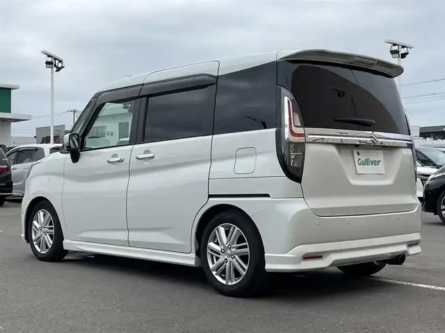 スズキ ソリオ HV MZ 東京都 2024(令6)年 1.6万km ピュアホワイトP アラウンドビューモニター　/両側電動スライドドア　/ヘッドアップディスプレイ　/純正８型ナビ　/・ＨＤＭＩ　/・Ｂｌｕｅｔｏｏｔｈ　/・フルセグ　/オートクルーズ　/レーンキープアシスト　/クリアランスソナー