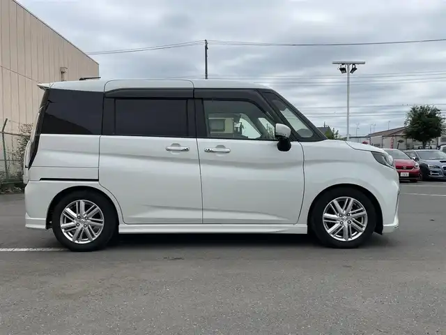 スズキ ソリオ HV MZ 東京都 2024(令6)年 1.6万km ピュアホワイトP アラウンドビューモニター　/両側電動スライドドア　/ヘッドアップディスプレイ　/純正８型ナビ　/・ＨＤＭＩ　/・Ｂｌｕｅｔｏｏｔｈ　/・フルセグ　/オートクルーズ　/レーンキープアシスト　/クリアランスソナー