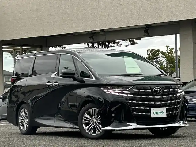 トヨタ アルファードハイブリット Z 宮城県 2024(令6)年 1万km ブラック 純正ナビ/フルセグＴＶ/Ｂｌｕｅｔｏｏｔｈ/デジタルインナーミラー/ＨＵＤ/ＢＳＭ/レーンキープアシスト/クリアランスソナー/パーキングサポートブレーキ/ロードサインアシスト/レーダークルーズコントロール/横滑り防止装置/パノラミックビューモニター/オートハイビーム/全周囲バックカメラ/ドライブレコーダー/純正フリップダウンモニター/ムーンルーフ/スペアタイヤ/スマートキー×２