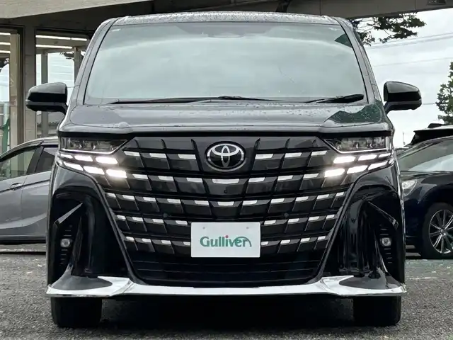 トヨタ アルファードハイブリット Z 宮城県 2024(令6)年 1万km ブラック 純正ナビ/フルセグＴＶ/Ｂｌｕｅｔｏｏｔｈ/デジタルインナーミラー/ＨＵＤ/ＢＳＭ/レーンキープアシスト/クリアランスソナー/パーキングサポートブレーキ/ロードサインアシスト/レーダークルーズコントロール/横滑り防止装置/パノラミックビューモニター/オートハイビーム/全周囲バックカメラ/ドライブレコーダー/純正フリップダウンモニター/ムーンルーフ/スペアタイヤ/スマートキー×２