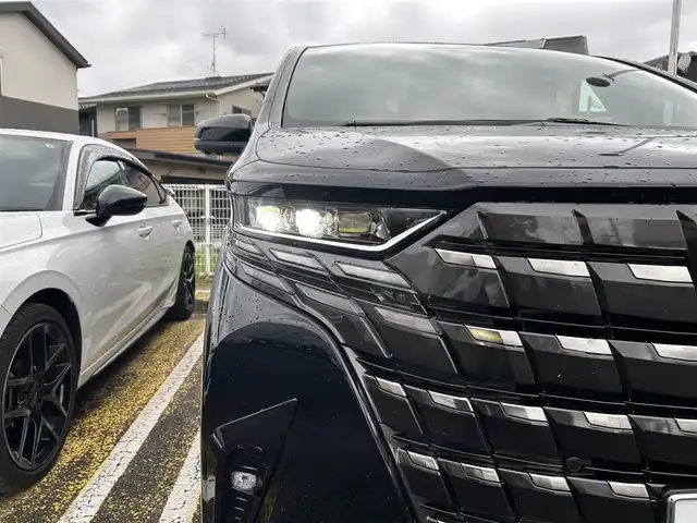 トヨタ アルファードハイブリット Z 宮城県 2024(令6)年 1万km ブラック 純正ナビ/フルセグＴＶ/Ｂｌｕｅｔｏｏｔｈ/デジタルインナーミラー/ＨＵＤ/ＢＳＭ/レーンキープアシスト/クリアランスソナー/パーキングサポートブレーキ/ロードサインアシスト/レーダークルーズコントロール/横滑り防止装置/パノラミックビューモニター/オートハイビーム/全周囲バックカメラ/ドライブレコーダー/純正フリップダウンモニター/ムーンルーフ/スペアタイヤ/スマートキー×２