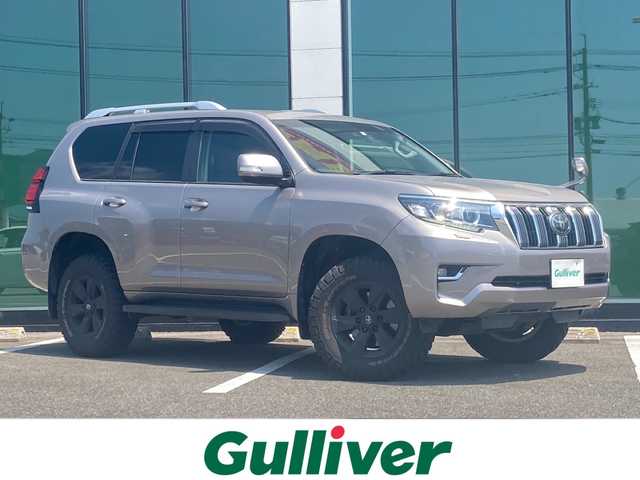 トヨタ ランドクルーザー プラド TX 福岡県 2018(平30)年 9.8万km アバンギャルドブロンズメタリック トヨタセーフティセンス/サンルーフ/ルーフレール/１７インチアルミホイル/社外ナビ　フルセグ　Bluetooth AVIC-CN902/バックカメラ/マッドテレンタイヤBFグッドリッチ255/75R17/前後ドライブレコーダー/ウッドコンビハンドル/シートカバー/スマートキー/プッシュスタートエンジン/ETC/LEDライト/フォグライト