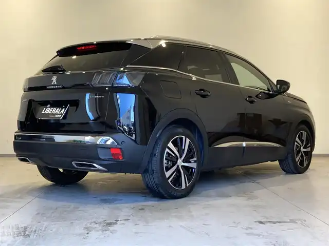 プジョー プジョー ３００８ GT ハイブリッド4 熊本県 2021(令3)年 2万km ペルラネラブラック ・スマートキー/・プッシュスタート/・アクティブセーフティブレーキ/・トラフィックサインインフォメーション/・疲労検知/・アダプティブライト/・インテリジェントハイビーム/・パークセンサー/・ブラインドスポットモニター/・クルーズコントロール(追従式)/・ハーフレザーシート/・D席パワーシート/・前席シートヒーター/・純正メモリナビ/　【Bletooth・USB・AppleCarPlay・AndroidAuto】/・フルセグTV/・バックカメラ＆左サイドカメラ/・ETC/・ドライブレコーダー(前後録画)/・ワイヤレス充電/・パワーバックドア/・LEDヘッドランプ/・純正マット