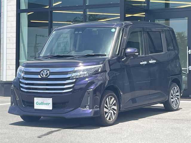 トヨタ ルーミー カスタムG 愛媛県 2022(令4)年 2.7万km クールバイオレットクリスタルシャイン 純正9インチディスプレイオーディオ　/AppleCarPlay/BT/フルセグ/バックカメラ/両側電動スライド　　/トヨタセーフティセンス/レーダークルーズコントロール　　/衝突被害軽減装置/車線逸脱防止装置/前後コーナーセンサー/電動パーキングブレーキ/AutoHold/ドライブレコーダー　/LEDへッドライト　/アイドリングストップ/純正ドアバイザー/電格ミラー/シガーソケット/ISOFIX/現状サマー(純正AW)(165/65/R14)/GOODYEAR effecientgrip