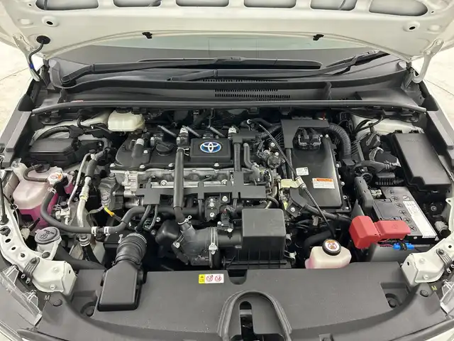 トヨタ カローラツーリング ハイブリッド ダブルバイビー 愛知県 2021(令3)年 2.4万km ホワイトパールクリスタルシャイン 禁煙車/純正9インチナビ/（CD/DVD/Bluetooth/フルセグTV/USB/AM/FM)/バックカメラ/AC100V電源/トヨタセーフティセンス/・プリクラッシュセーフティ/・レーントレーシングアシスト/・パーキングセンサー/・パーキングサポートブレーキ/・ロードサインアシスト/・レーダークルーズコントロール/・オートマチックハイビーム/ETC/前後ドライブレコーダー/シートヒーター/ハーフレザーシート/ステアリングヒーター/純正17インチアルミホイール/スマートキー/プッシュスタート/LEDヘッドライト/フロントフォグランプ/オートライト/純正フロアマット/電子パーキングブレーキ/オートホールド/横滑り防止装置/電動格納ミラー