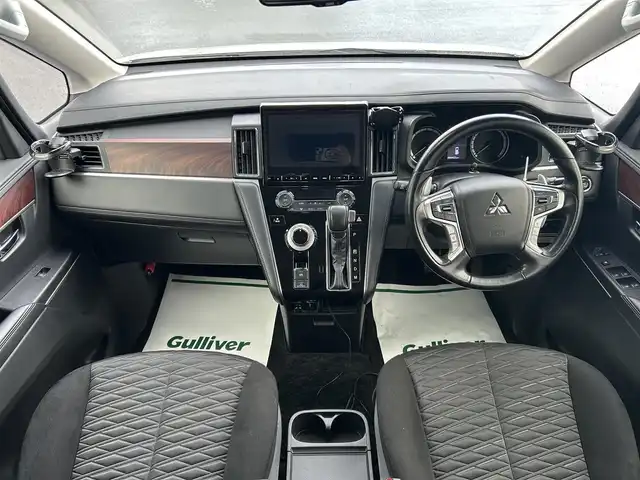 三菱 デリカＤ：５ P 山形県 2020(令2)年 7万km ウォームホワイトパール 4WD/寒冷地仕様/衝突被害軽減システム/フリップダウンモニター/ターボ/純正メモリナビ/　　【CD　DVD　BT　フルセグ　USB　AUX　MSV】/全周囲カメラ/両側パワースライドドア/レーダークルーズコントロール/LEDオートライト/シートヒーター/16インチアルミホイール/オートサイドステップ/ブラインドスポットモニター/パドルシフト/ステアリングスイッチ/純正フロアマット/スマートキー/ETC