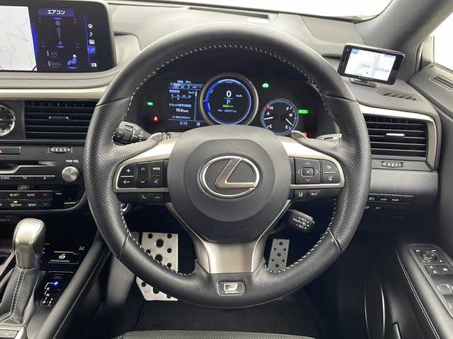 レクサス ＲＸ 450h Fスポーツ 千葉県 2020(令2)年 4.9万km ホワイトノーヴァガラスフレーク 純正ナビ/　CD/DVD/Bluetooth/フルセグTV/　Apple car play/Android Auto/レクサスセーフティシステム/レーダークルーズコントロール/レーンキープアシスト/衝突軽減ブレーキ/クリアランスソナー/アラウンドビューモニター/ブラインドスポットモニター/ヘッドアップディスプレイ/先行車発進警報/ロードサインアシスト/電動パーキング/オートホールド/オートハイビーム/レザーシート/エアヒーター/パワーシート（前席）/全席シートヒーター/シートメモリー（運転席）/ステアリングヒーター/ビルトインETC２．０/前方ドラレコ/AC100V充電/パドルシフト/三眼LEDライト/フォグランプ/レーダー探知機/ロールサンシェード/フロアマット