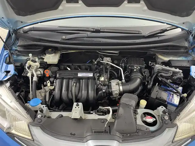 ホンダ フィット ハイブリット Sパッケージ 千葉県 2014(平26)年 3万km ビビットスカイブルーP 禁煙車/シティブレーキアクティブシステム/クルーズコントロール/純正メモリナビ/・型番：VXM-142VFi/・CD/DVD/Bluetooth/フルセグTV/・バックカメラ/・ビルトインETC/革巻きステアリング/・ステアリングスイッチ/・パドルシフト/純正フロアマット/純正１６インチAW/オートライト/・LEDヘッドライト/・フォグランプ