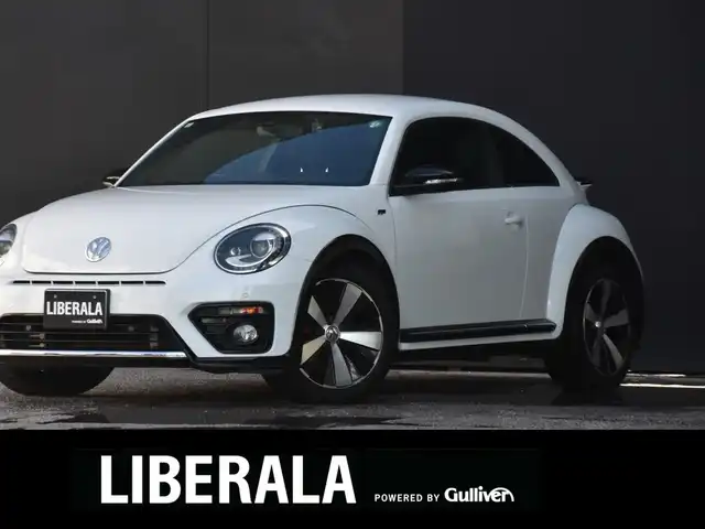 フォルクスワーゲン ザ・ビートル 2．0 Rライン 和歌山県 2016(平28)年 6.8万km 白 3連メーター /純正ナビ /フルセグ /Bカメラ /リヤスポイラー /ツインエキゾーストパイプ /レッドブレーキキャリパー /クルーズコントロール /コーナーセンサー /純正18AW /プッシュスタート /オートライト /MTモード付AT /ETC