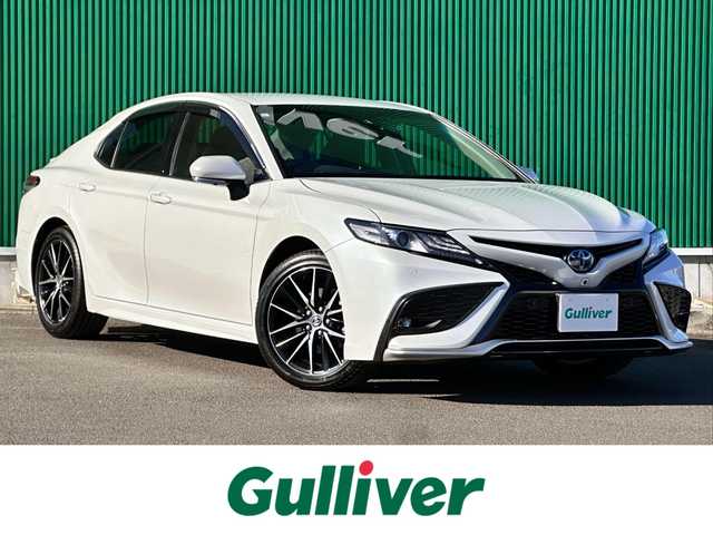 トヨタ カムリ WSレザーパッケージ 宮城県 2023(令5)年 0.2万km プラチナホワイトパールマイカ パノラミックビューモニター/＝＝＝/セーフティセンス/・プリクラッシュセーフティ/・レーダークルーズコントロール（カーブ速度抑制機能付）/・レーントレーシングアシスト/・オートマチックハイビーム/・ドライバー異常時対応システム/・ロードサインアシスト/先行車発進告知機能/ブラインドスポットモニター/リアクロストラフィックオートブレーキ/インテリジェントクリアランスソナー/カラーヘッドアップディスプレイ/9インチディスプレイオーディオ/・Tコネクトナビキット/・Bluetooth/ビルトインETC/ドライブレコーダー/本革シート/パワーシート/シートヒーター/革巻きステアリング/ステアリングスイッチ/電動パーキングブレーキ/ブレーキホールド/LEDヘッドランプ/LEDデイライト/フォグランプ/オートライト/スマートキー＆プッシュスタート/電動格納ミラー/純正18インチAW/純正フロアマット/純正ドアバイザー/W/サイド/カーテン/ニーエアバッグ