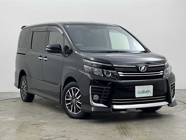 トヨタ ヴォクシー ZS 秋田県 2014(平26)年 9.2万km ブラック ディーラーＯＰナビ　NSZT-Y62G/・フルセグテレビ/・ＢＴ/・ＣＤ、ＤＶＤ、ＳＤ/・ラジオ/オールオートウィンドウ/フロントワイパーデアイサー/電動格納ミラー/セカンドシートサンシェード/前席デュアルエアコン/オートライト/ステアリングスイッチ
