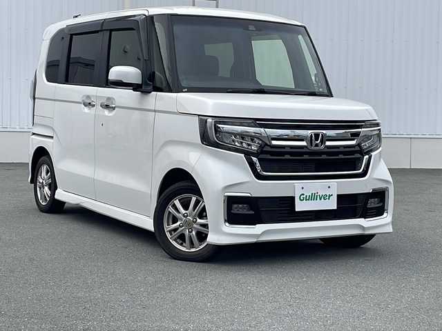 ホンダ Ｎ ＢＯＸ カスタム L 三重県 2021(令3)年 4.5万km プラチナホワイトパール プッシュスタート/片側パワースライドドア/レーンキープアシスト/衝突軽減ブレーキ/アイドリングストップ/電動格納ミラー/レーダークルーズコントロール/ステアリングスイッチ/横滑り防止/コーナーセンサー/シートヒーター(前席)/オートライト/純正SDナビ(AM/FM/CD/BT)/シートカバー付き/フロアマット/リアサンシェード/LEDヘッドライト/バックカメラ/禁煙車