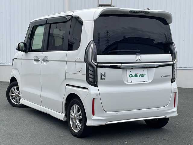 ホンダ Ｎ ＢＯＸ カスタム L 三重県 2021(令3)年 4.5万km プラチナホワイトパール プッシュスタート/片側パワースライドドア/レーンキープアシスト/衝突軽減ブレーキ/アイドリングストップ/電動格納ミラー/レーダークルーズコントロール/ステアリングスイッチ/横滑り防止/コーナーセンサー/シートヒーター(前席)/オートライト/純正SDナビ(AM/FM/CD/BT)/シートカバー付き/フロアマット/リアサンシェード/LEDヘッドライト/バックカメラ/禁煙車