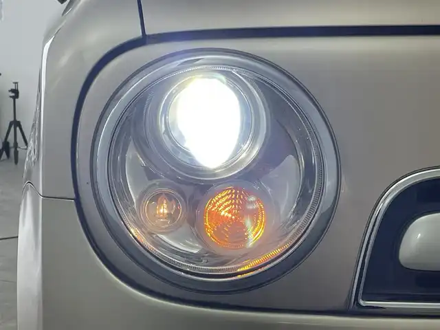 スズキ ラパン ショコラ G 群馬県 2015(平27)年 7万km シャンパンピンクPM 社外７インチナビ　Ｂｕｌｅｔｏｏｔｈ　フルセグ　ＣＤ　ＤＶＤ　前後ドライブレコーダー　ＨＩＤヘッドライト　オートライト　アイドリングストップ　スマートキー　プッシュスタート　シートカバー　禁煙車