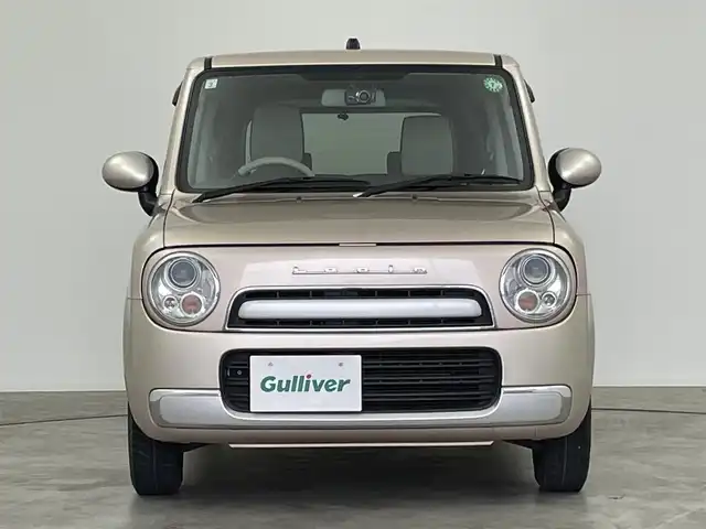 スズキ ラパン ショコラ G 群馬県 2015(平27)年 7万km シャンパンピンクPM 社外７インチナビ　Ｂｕｌｅｔｏｏｔｈ　フルセグ　ＣＤ　ＤＶＤ　前後ドライブレコーダー　ＨＩＤヘッドライト　オートライト　アイドリングストップ　スマートキー　プッシュスタート　シートカバー　禁煙車