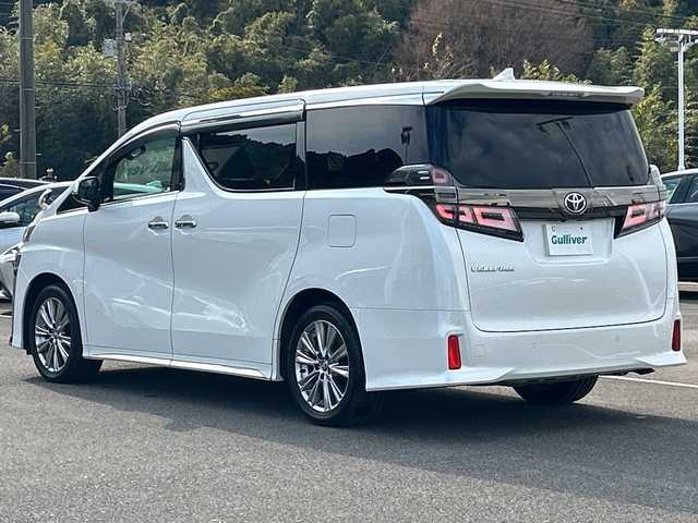 トヨタ ヴェルファイア ゴールデンアイズⅡ 佐賀県 2021(令3)年 3.6万km ホワイトパールクリスタルシャイン ・純正メーカーOPナビ/・デジタルインナーミラー/・バックカメラ/・パーキングサポートブレーキ/・プリクラッシュセーフティ/・ツインムーンルーフ/・安心降車アシスト/・レーダークルーズコントロール/・レーンディパーチャーアラート/・クリアランスソナー/・インテリジェントクリアランスソナー/・ブラインドスポットモニター（ＢＳＭ）/・社外ドライヴレコーダー前後/・両側パワースライドドア/・オットマン/・パワーバックドア/・純正18インチアルミホイール/・LEDヘッドライト/・フォグランプ/・スマートキー/・スペアキー×１