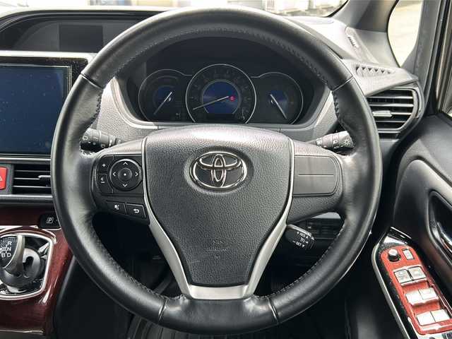 トヨタ ノア ハイブリッド Si ダブルバイビーⅡ 東京都 2020(令2)年 3.1万km ブラック ワンオーナー/Toyota Safety Sense/・PCS(プリクラッシュセーフティー)/・LDA(レーンディパーチャアラー)/・オートマチックハイビーム/・先行車発進告知機能/クルーズコントロール/クリアランスソナー/TOYOTA純正１０インチナビ/【フルセグ・Bluetooth】/フリップダウンモニター/バックカメラ/前方ドライブレコーダー/両側パワースライドドア/シートヒーター（運転席・助手席）/純正16インチアルミ/純正フロアマット/スマートキー/スペアキー/保証書/取説
