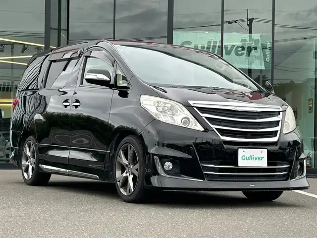 トヨタ アルファード 350G Lパッケージ 鹿児島県 2012(平24)年 14.1万km ブラック モデリスタエアロ/サンルーフ/フリップダウンモニター/純正ナビ/　　CD/DVD/BT/フルセグ/バックカメラ/両側パワースライドドア/クルーズコントロール/HIDオートライト/シートヒーター/社外19インチアルミホイール/ステアリングスイッチ/リアオートエアコン/アイドリングストップ/スマートキー/ETC