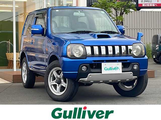 スズキ ジムニー クロスアドベンチャー XC 道央・札幌 2012(平24)年 5万km パールメタリックカシミールブルー ・４WD/・社外ナビ/　CD＆BT＆TV/・シートヒーター/・ミラーヒーター/・電動格納ミラー/・純正フロアマット/・背面タイヤ/・ウィンカーミラー/・フォグライト/・リモコンキー